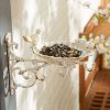 Accent Plus Wall-Mounted Cast Iron Scrolled Bird Feeder with Rust Accents